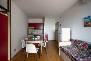 Apartment, 2 Bedrooms, Balcony, Ocean View | Dining room - Charming Apartment Near the Beach in Bibione (San Michele al Tagliamento)