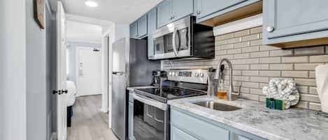Signature Condo, 1 Bedroom, Beach View, Beachfront | Private kitchen | Microwave, oven, stovetop, coffee/tea maker