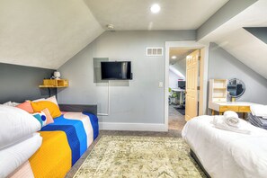 4 bedrooms, desk, iron/ironing board, travel cot