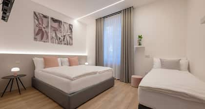 Triple room consisting of double bed and single sofa bed