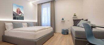 Camera tripla composta da letto matrimoniale e divano letto singolo