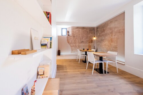 Spacious, bright room in a medieval tower. Shared space on ground floor.