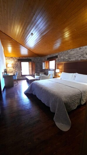 Premium bedding, down comforters, desk, laptop workspace