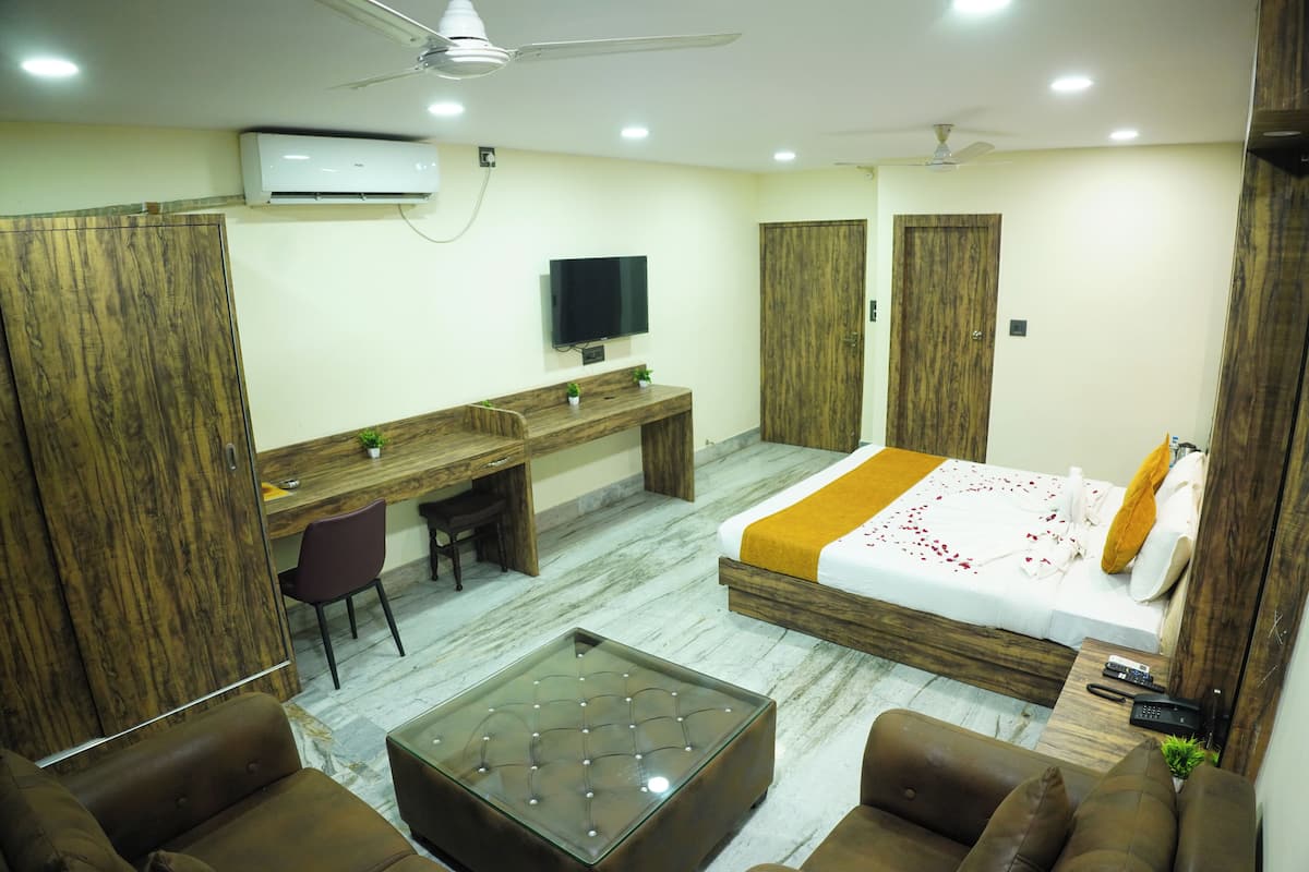 Suite Luxury, vista città | 1 camera, ferro/asse da stiro, Wi-Fi gratuito, lenzuola