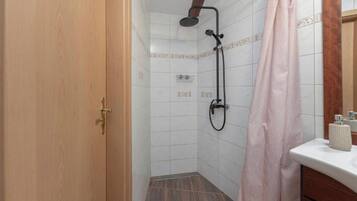 Standard Studio (Fairy-Tale Apartment From 17th) | Bathroom | Shower, towels, soap, shampoo