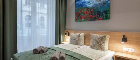 Superior Studio | Desk, laptop workspace, blackout curtains, soundproofing