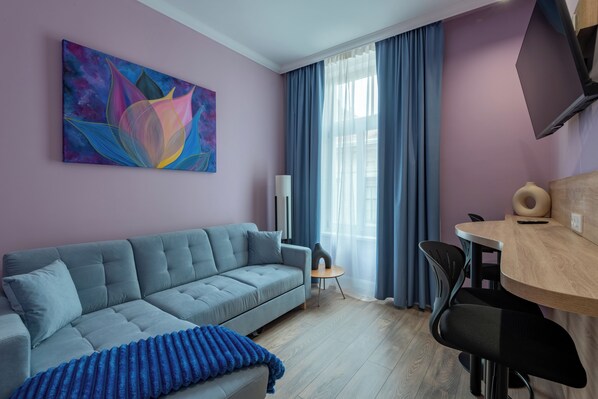 Family Apartment | Desk, laptop workspace, blackout curtains, soundproofing