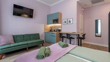 Standard Apartment | Desk, laptop workspace, blackout drapes, soundproofing