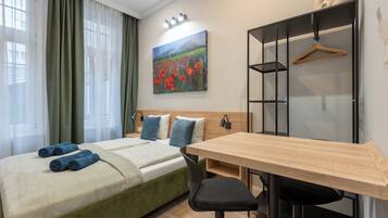 Desk, laptop workspace, blackout curtains, soundproofing