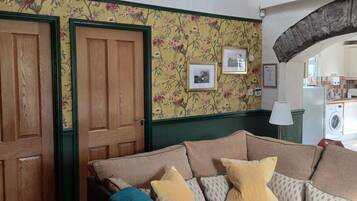 Cottage, 2 Bedrooms | Living area | 38-inch Smart TV with digital channels