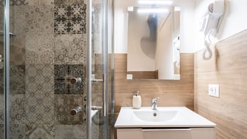 Double Room | Bathroom | Shower, hair dryer, towels, soap