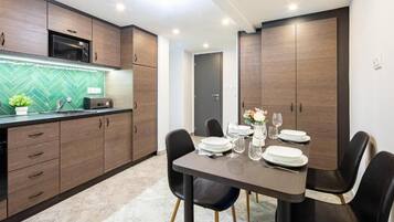 Apartment, Multiple Beds | Private kitchen | Electric kettle, toaster