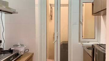Appartement, 1 grand lit, vue ville | Cuisine privée