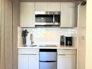 Fridge, microwave, stovetop, coffee/tea maker