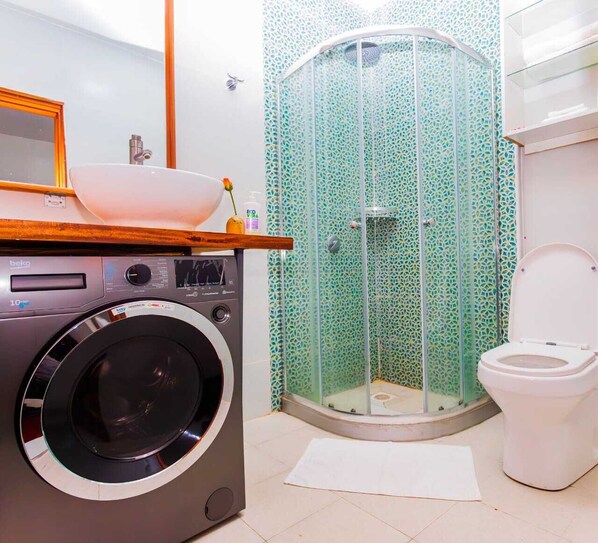 Eco-friendly toiletries, hair dryer, towels, soap