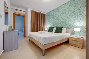 1 chambre, fer et planche à repasser, Wi-Fi gratuit, draps fournis