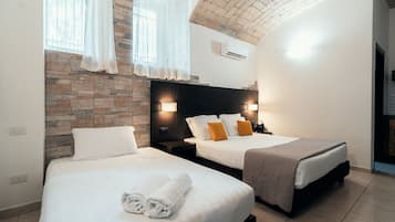 Classic Triple Room | Free minibar items, desk, laptop workspace, free WiFi