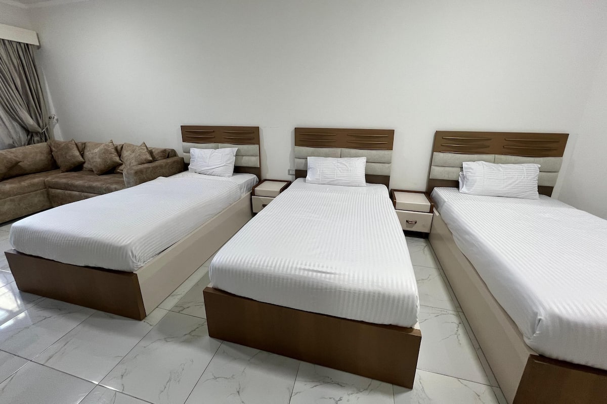 Triple Room, Sea View | In-room safe, desk, laptop workspace, blackout drapes