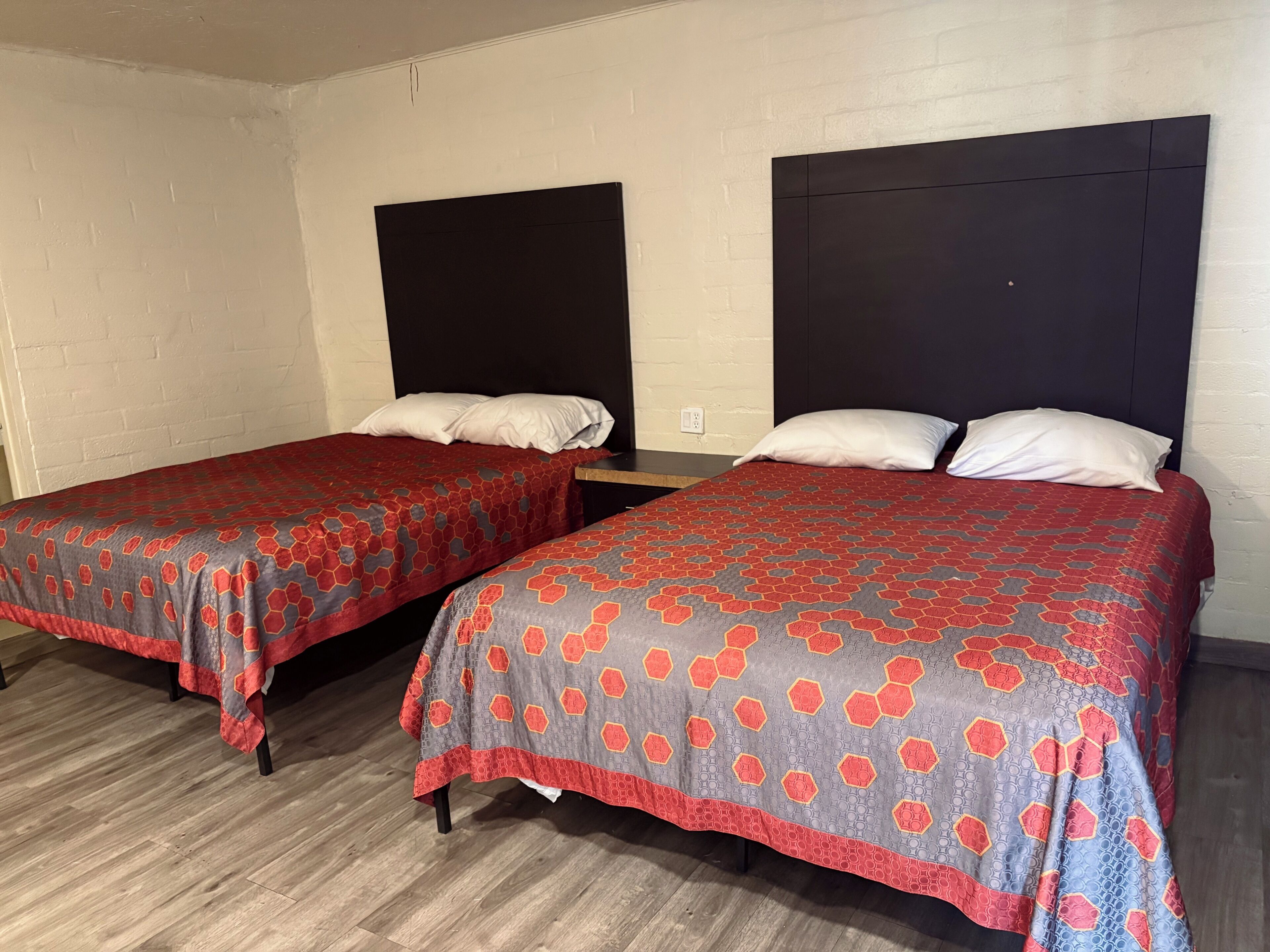 Classic Quadruple Room, 2 Queen Beds | Desk, laptop workspace, free WiFi