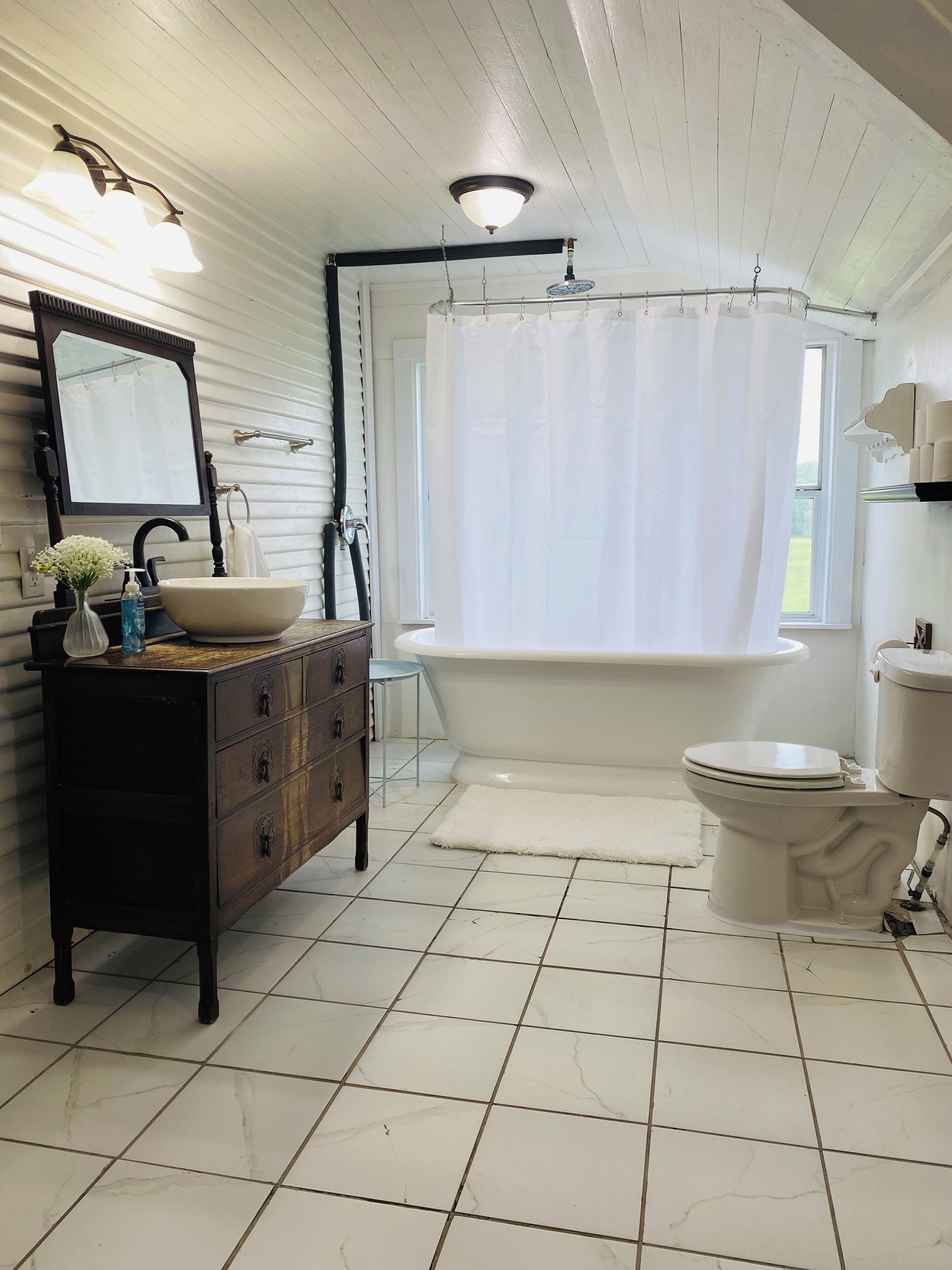 Hair dryer, towels, soap, toilet paper