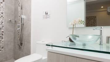 Shower, rainfall showerhead, towels, soap