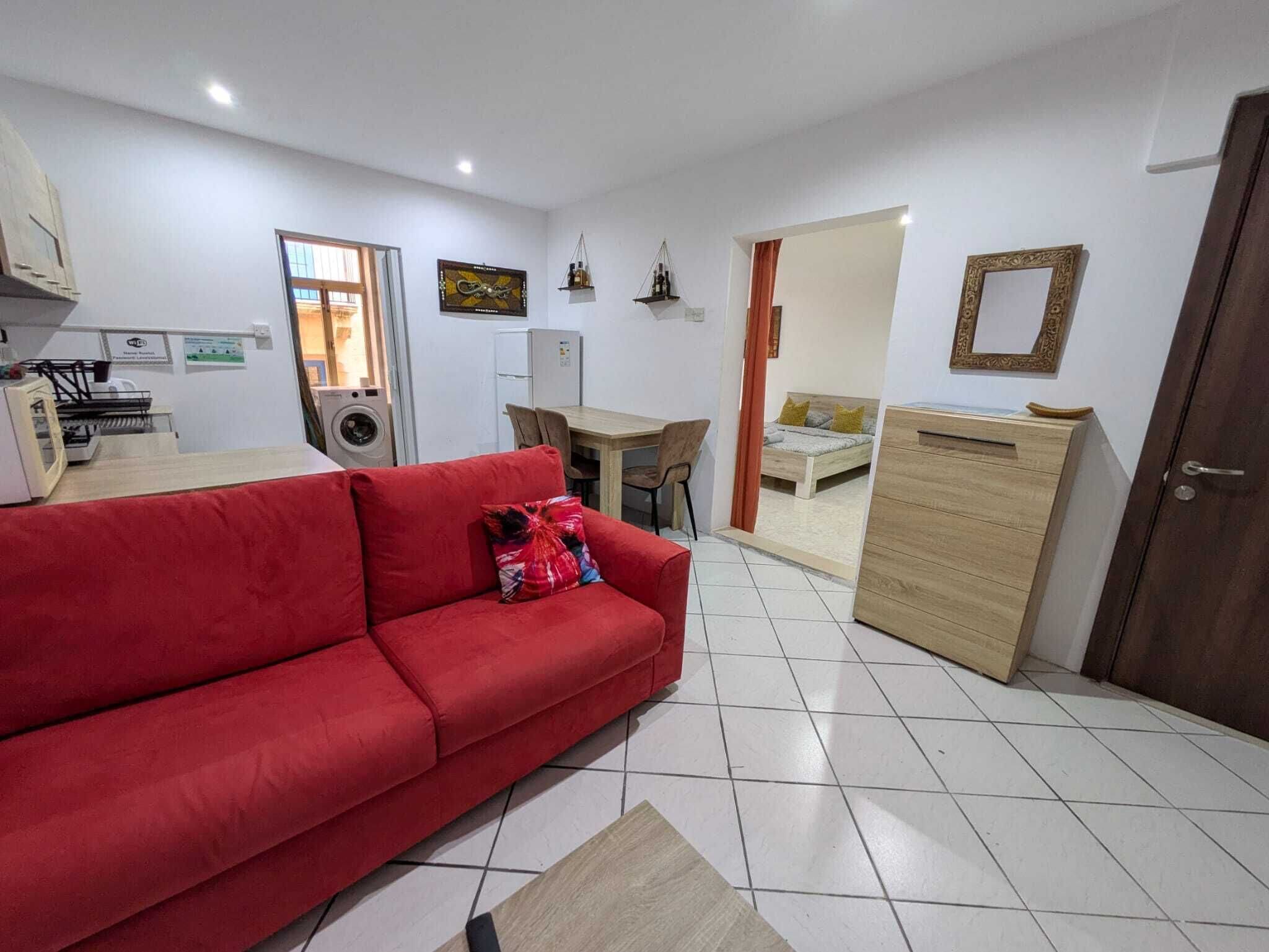 Appartamento, 1 camera da letto, balcone, vista città | Soggiorno | Libri