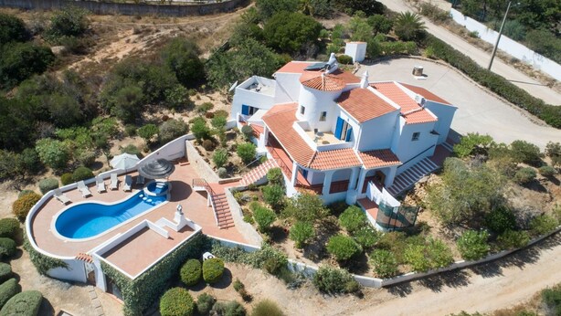 An aerial view of a large, white villa with a swimming pool, surrounded by landscaped gardens and a hilly landscape. - Engenho Three Bed Villa With Beautiful Countrysi (Lagoa)