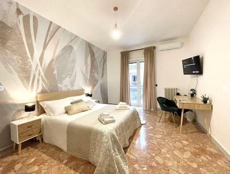 Habitación doble | Insonorización, tabla de planchar con plancha y wifi gratis . BARIROOMS - PICCINNI