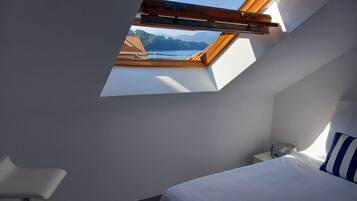 1 slaapkamer, een strijkplank/strijkijzer, beddengoed