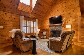 Smart TV, fireplace, foosball, books