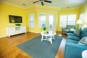 Premier Condo, 1 Bedroom, Kitchen | Living area | 50-inch flat-screen TV with cable channels, DVD player