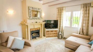 Villa | Living area | Fireplace