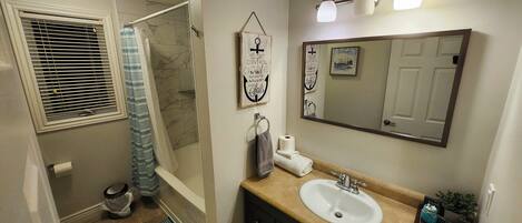 Hair dryer, towels, soap, shampoo