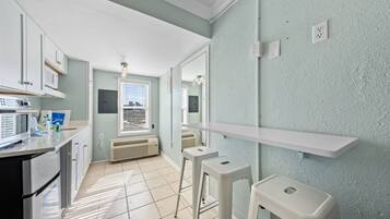 Microwave, coffee/tea maker, toaster, cookware/dishes/utensils