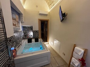 Shower, jetted tub, hair dryer, bidet
