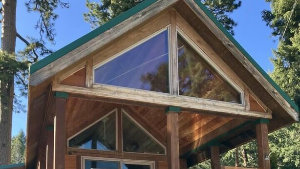 A wooden cabin with a balcony, a staircase, and a sign that reads "Lakeview". - Cabin #23 at Hyatt Lake Resort (Jackson County)