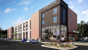 A modern hotel building with a prominent sign reading "ATWELL SUITES." - Atwell Suites Belgrade Bozeman Airport by IHG (Belgrade)