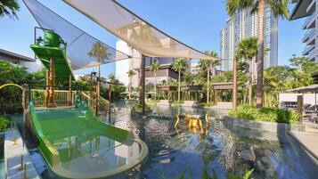 2 outdoor pools, open 7:00 AM to 6:00 PM, pool umbrellas