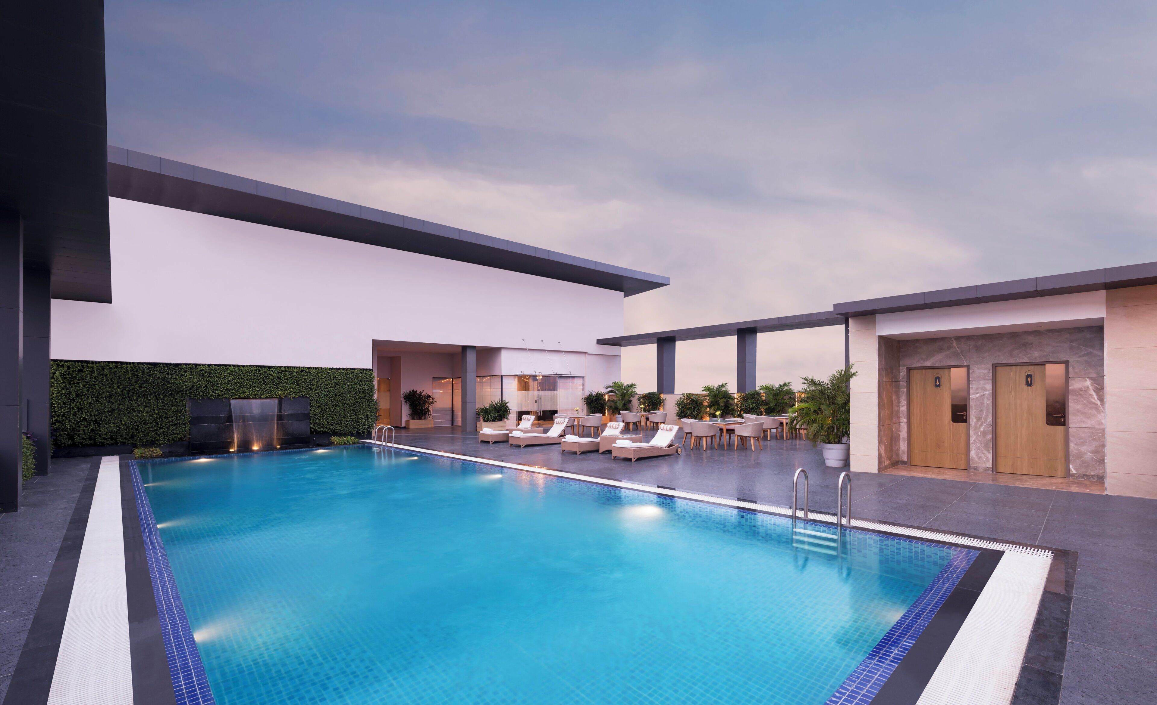 Outdoor pool, pool umbrellas, pool loungers