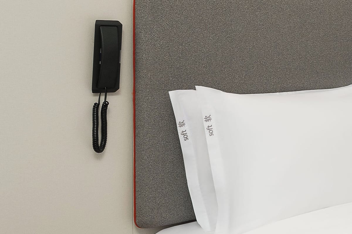 Down comforters, desk, blackout drapes, soundproofing