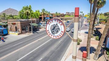 A street view with a prominent sign reading "Old Town Scottsdale."