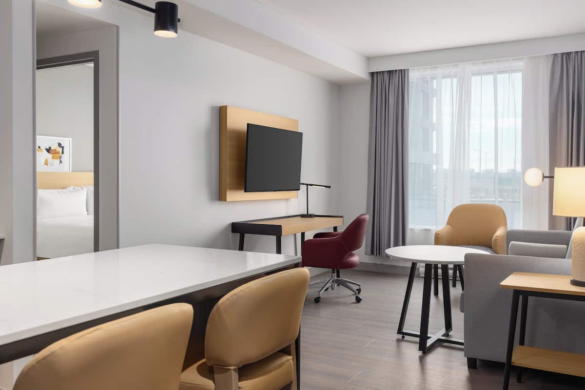 Premium bedding, pillow-top beds, desk, laptop workspace