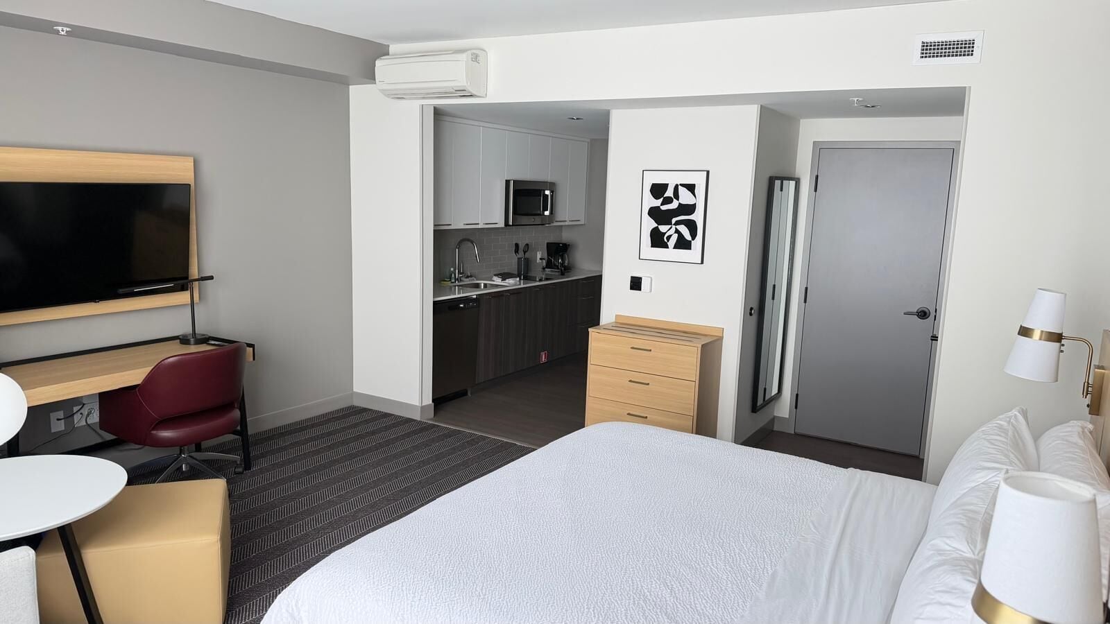 Premium bedding, pillow-top beds, desk, laptop workspace