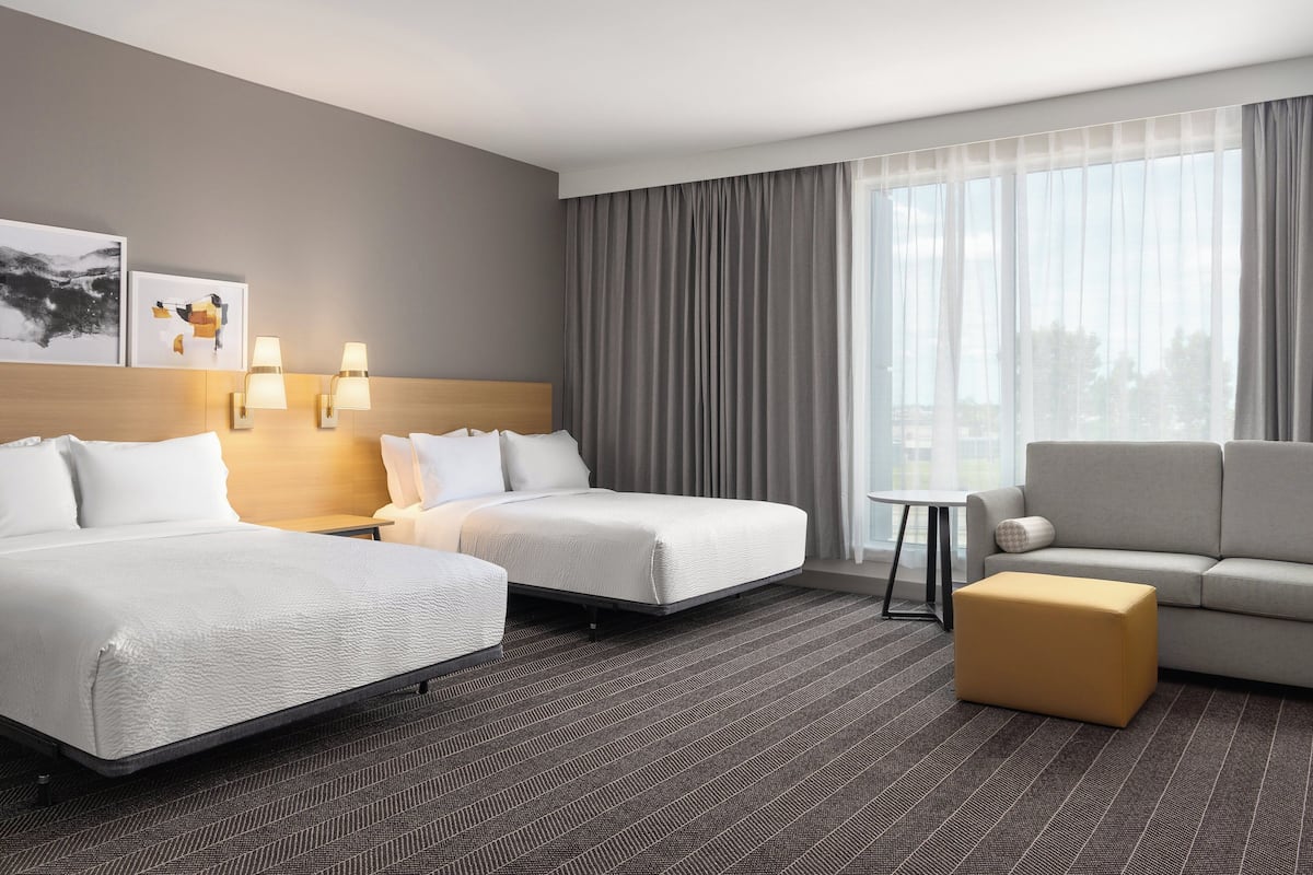 Premium bedding, pillowtop beds, desk, laptop workspace