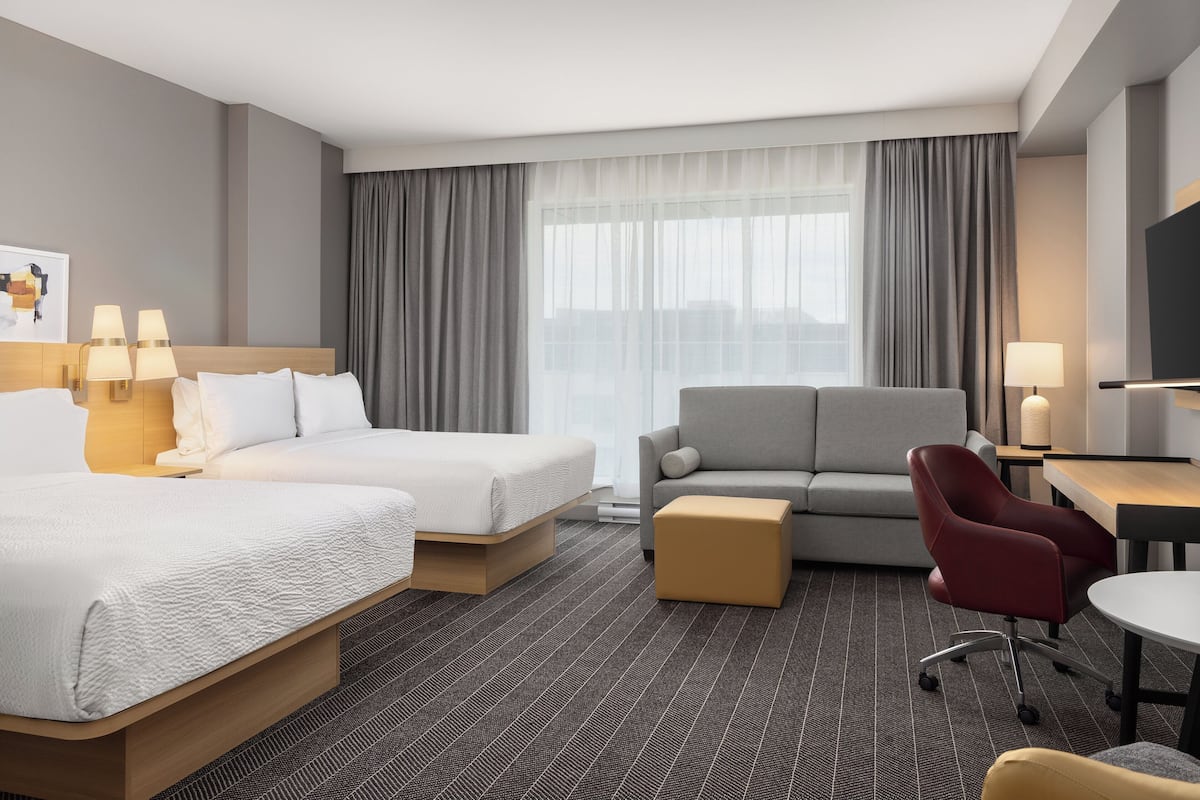 Premium bedding, pillowtop beds, desk, laptop workspace