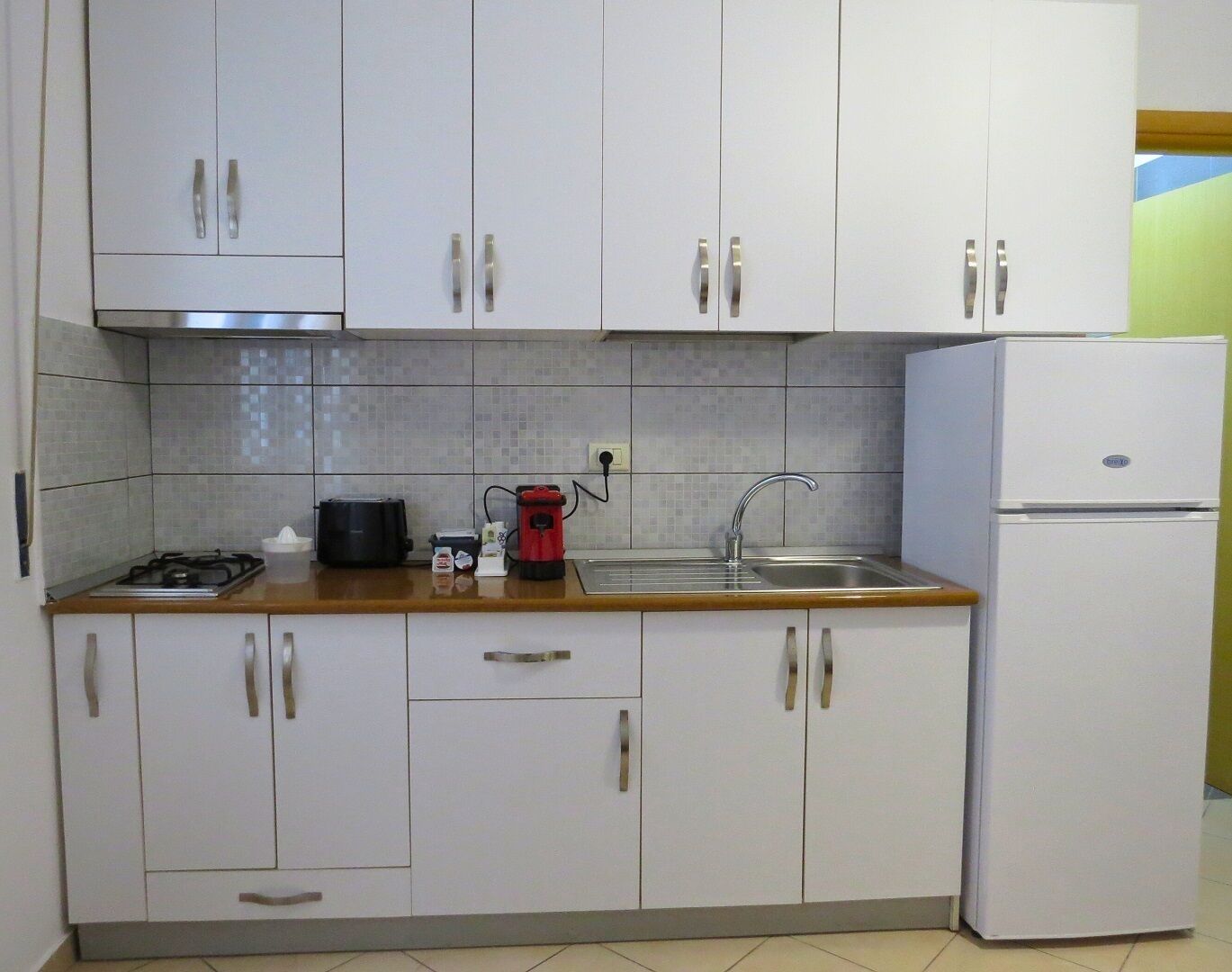 Microwave, stovetop, coffee/tea maker, electric kettle