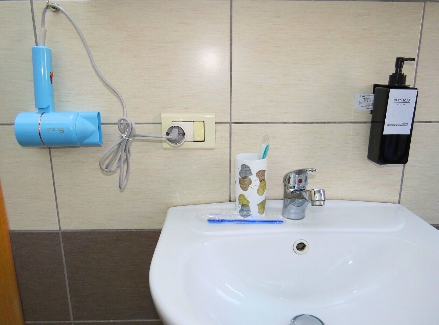 Hair dryer, towels, soap, shampoo