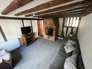 Cottage | Woonruimte | Een open haard