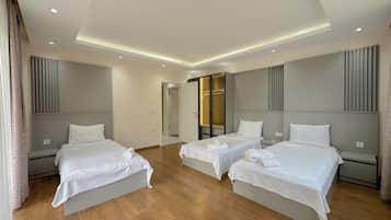 Deluxe Suite, 3 Bedrooms, Balcony, Resort View | 3 bedrooms, soundproofing, iron/ironing board, free WiFi