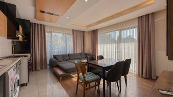 Royal Duplex, 3 Bedrooms, Kitchen | Living room | 53-inch TV with satellite channels